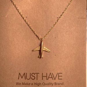 Gold tone airplane necklace for lovers of travel 🧳 ✈️🌎.
